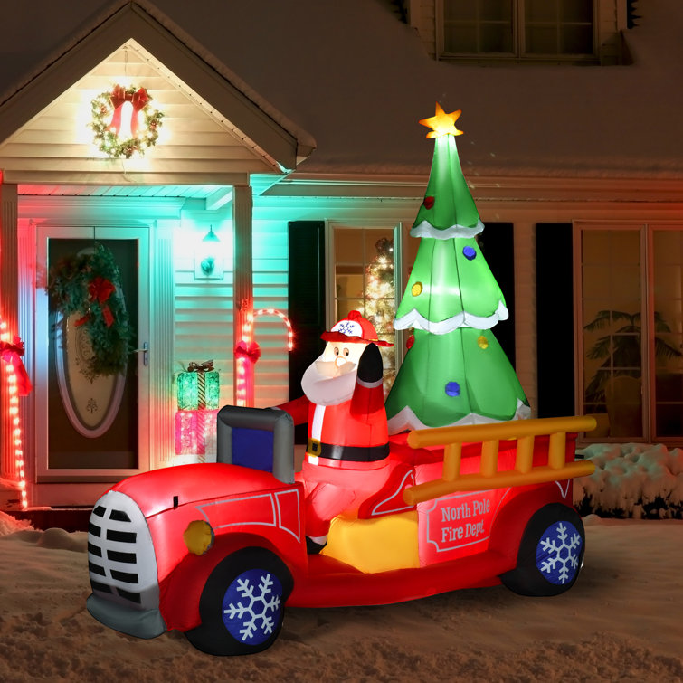 The Holiday Aisle® Christmas Santa Fire Truck Decoration with LED